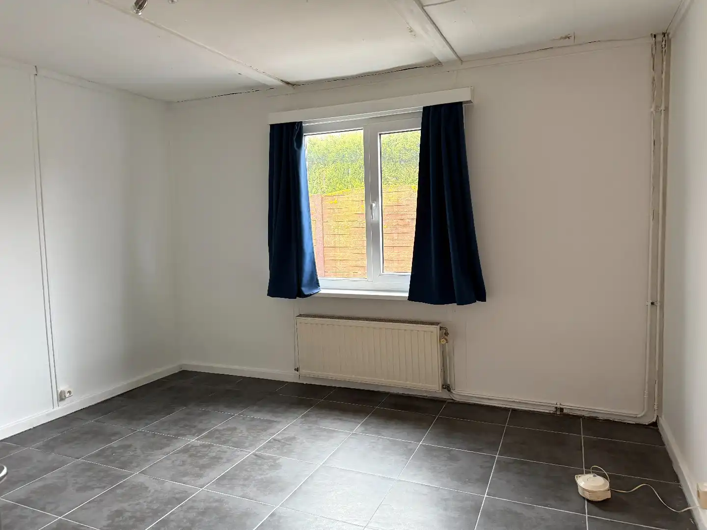 Laagbouwwoning met 2 slpk, carport en tuin foto 7