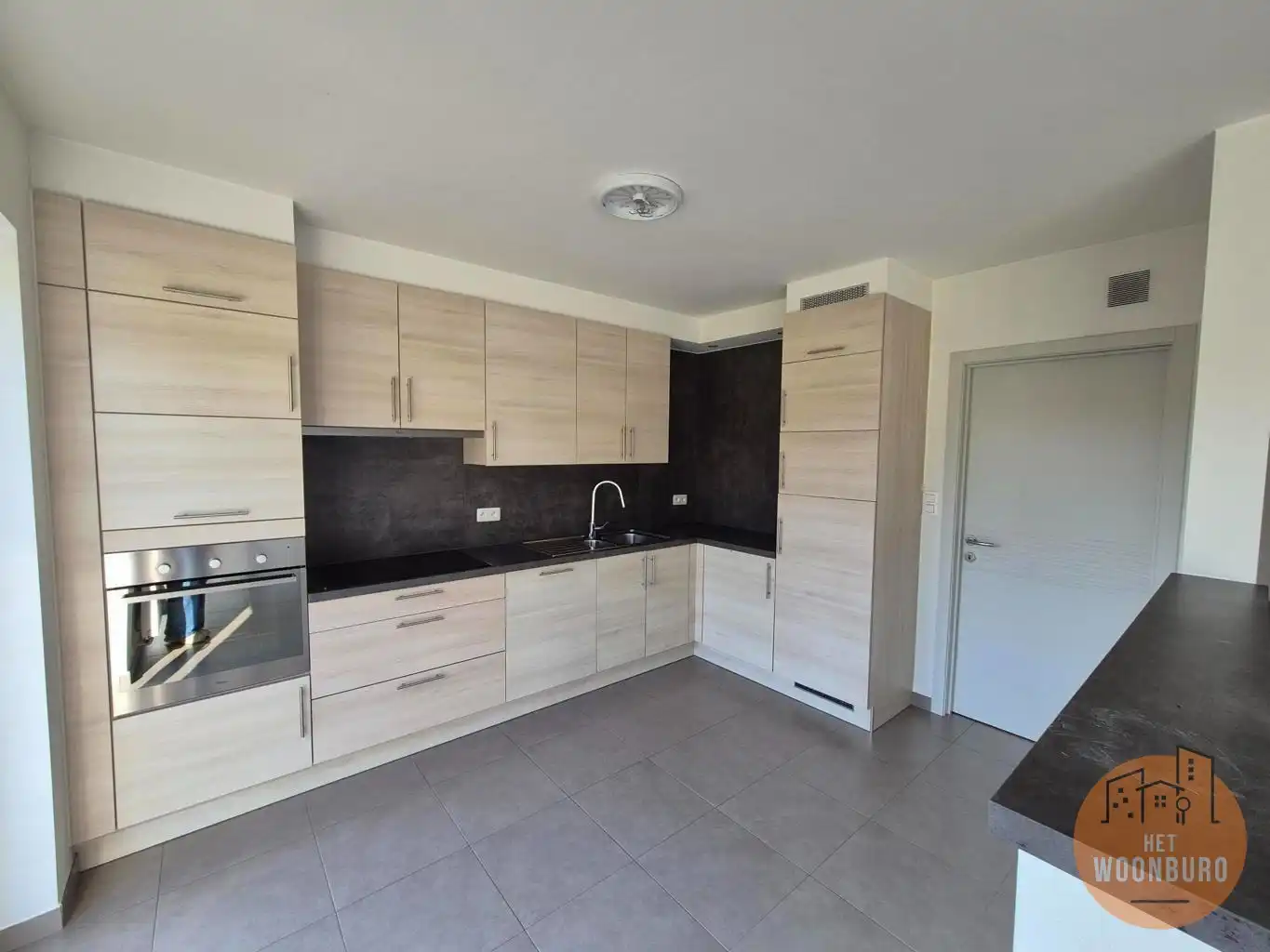 Halfopen bebouwing met 3 slpks, zolder, garage en tuin foto 4