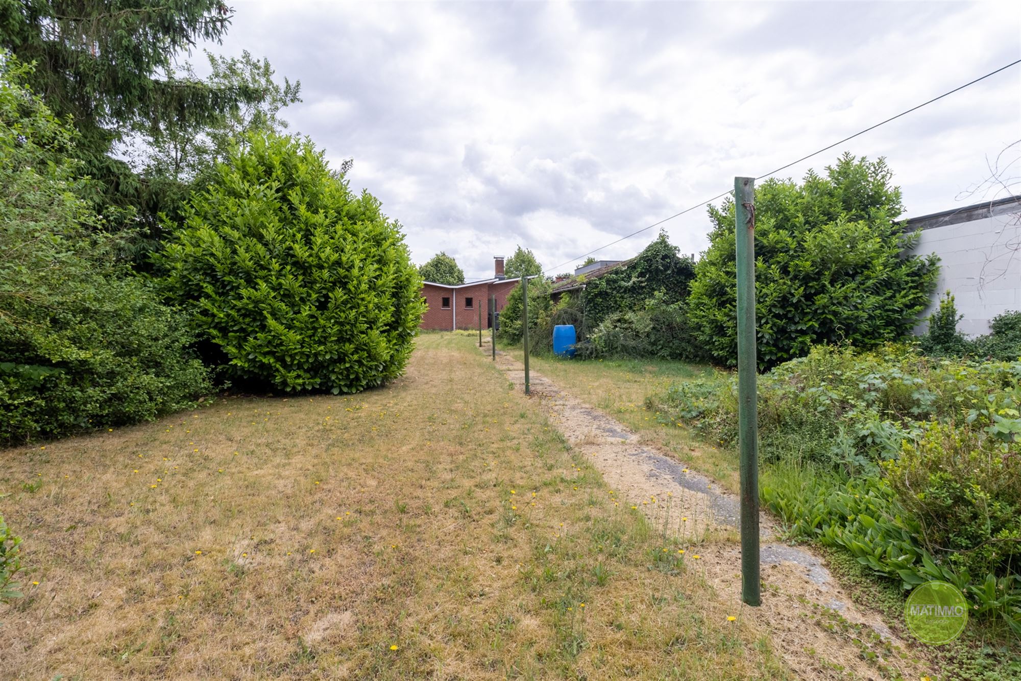 Vrijstaande laagbouwwoning met grote tuin in Mol-rauw foto 15