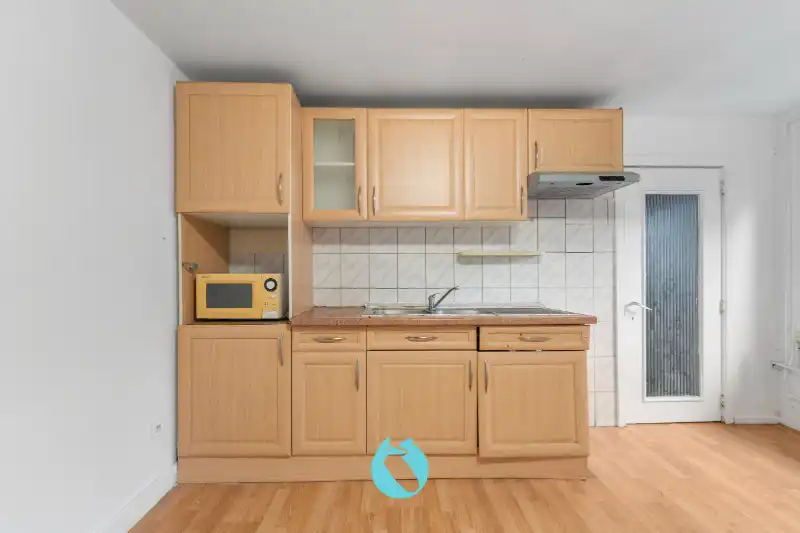 Te renoveren pand in tweede bouwlijn met private oprit en tuin foto 8