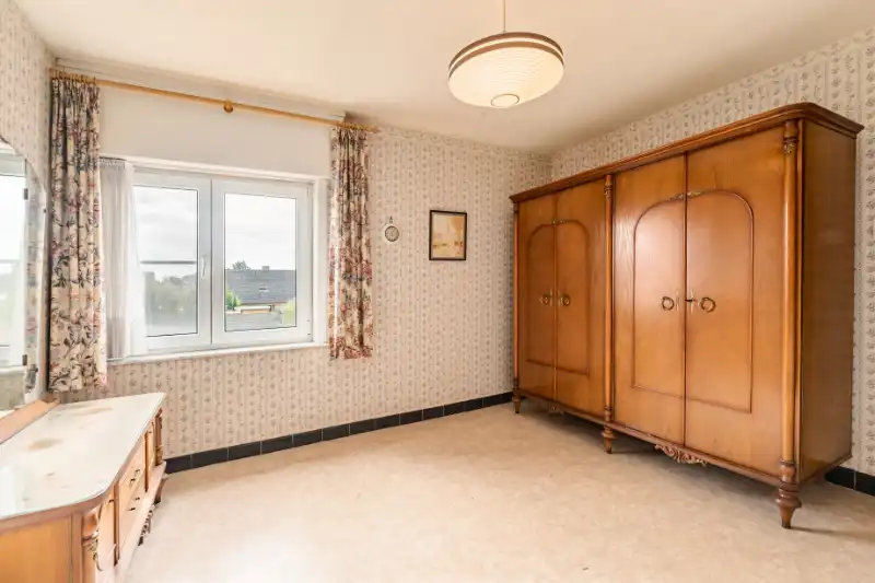 Ruime halfopen woning met potentieel foto 9