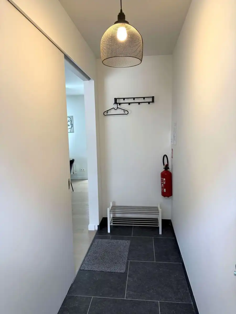 Recent gerenoveerd en volledig gemeubeld rijhuis met tuin te huur foto 24