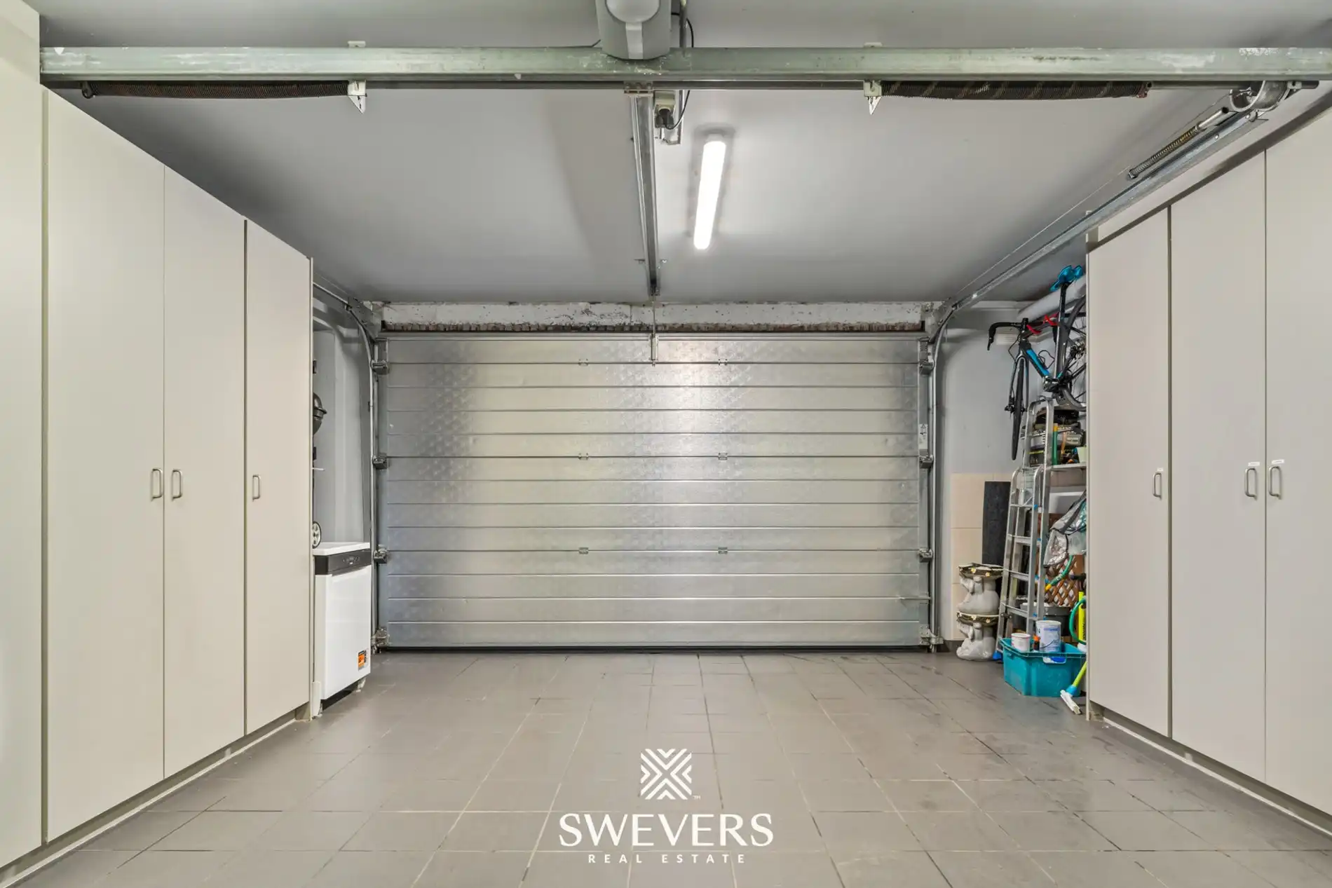 Zonnige bel-etage met dubbele garage en groot terras vlakbij het centrum van Heusden foto 24