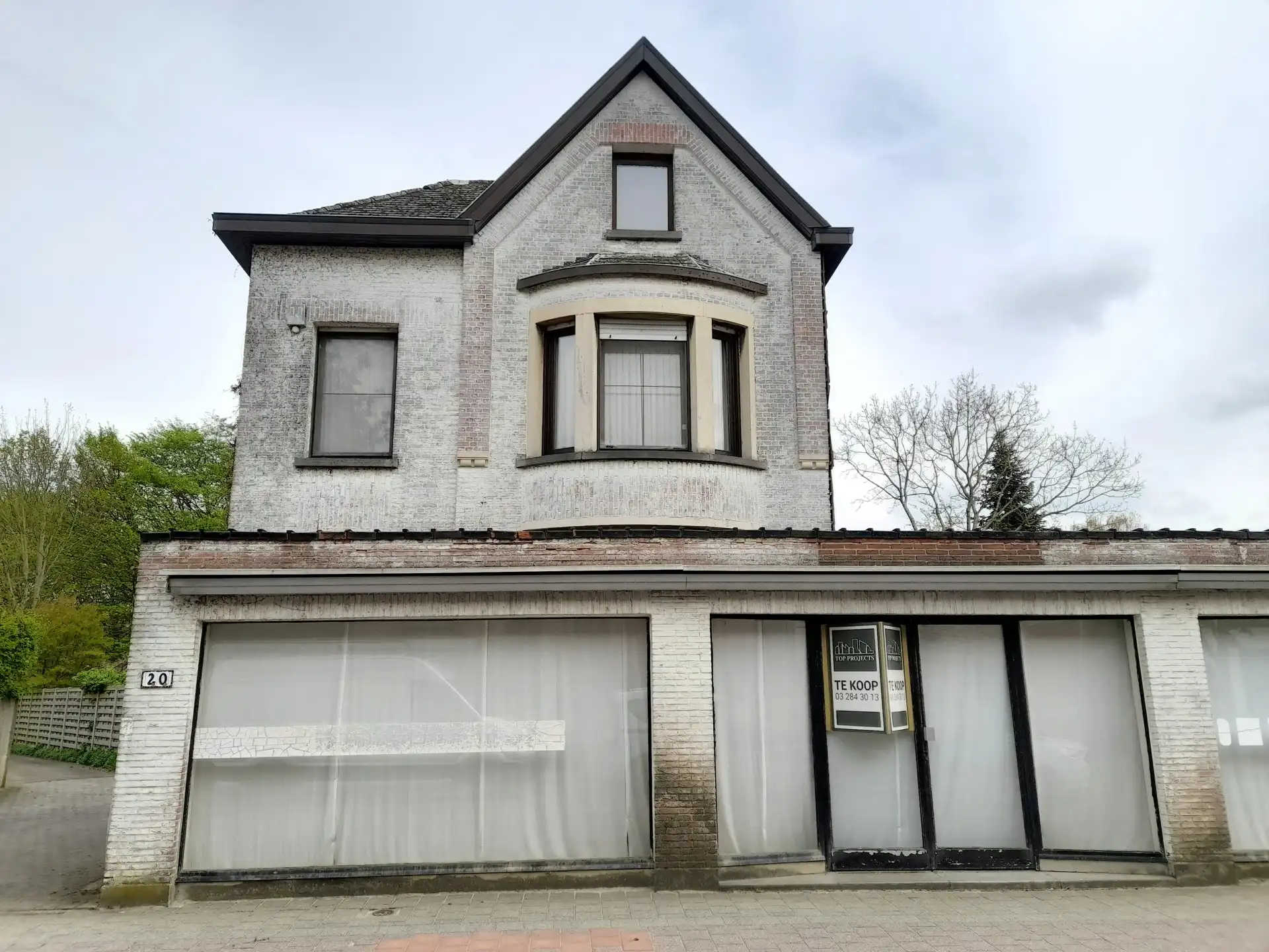 Handelspand met woonhuis en tuintje foto 2