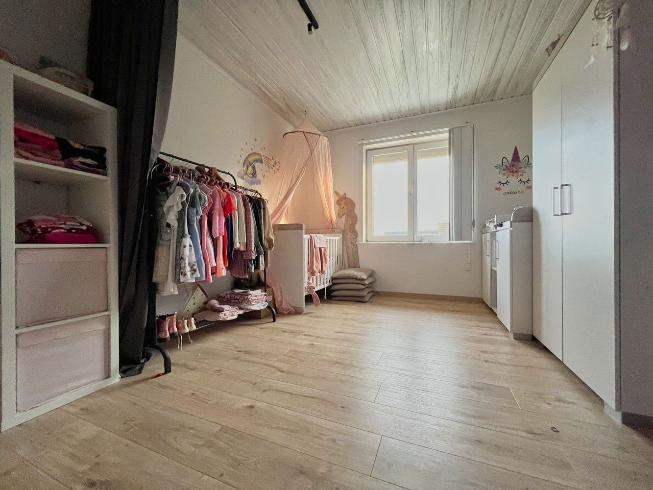 Ruime, lichtrijke woning met zonnige tuin+ aparte garage foto 9