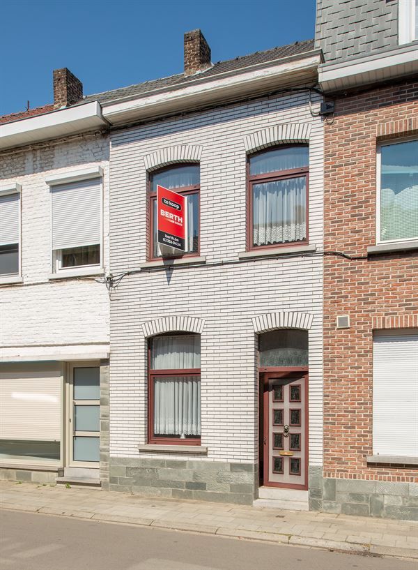 Een eengezinswoning met 3 slaapkamers en tuin, gelegen in het stadscentrum foto 2