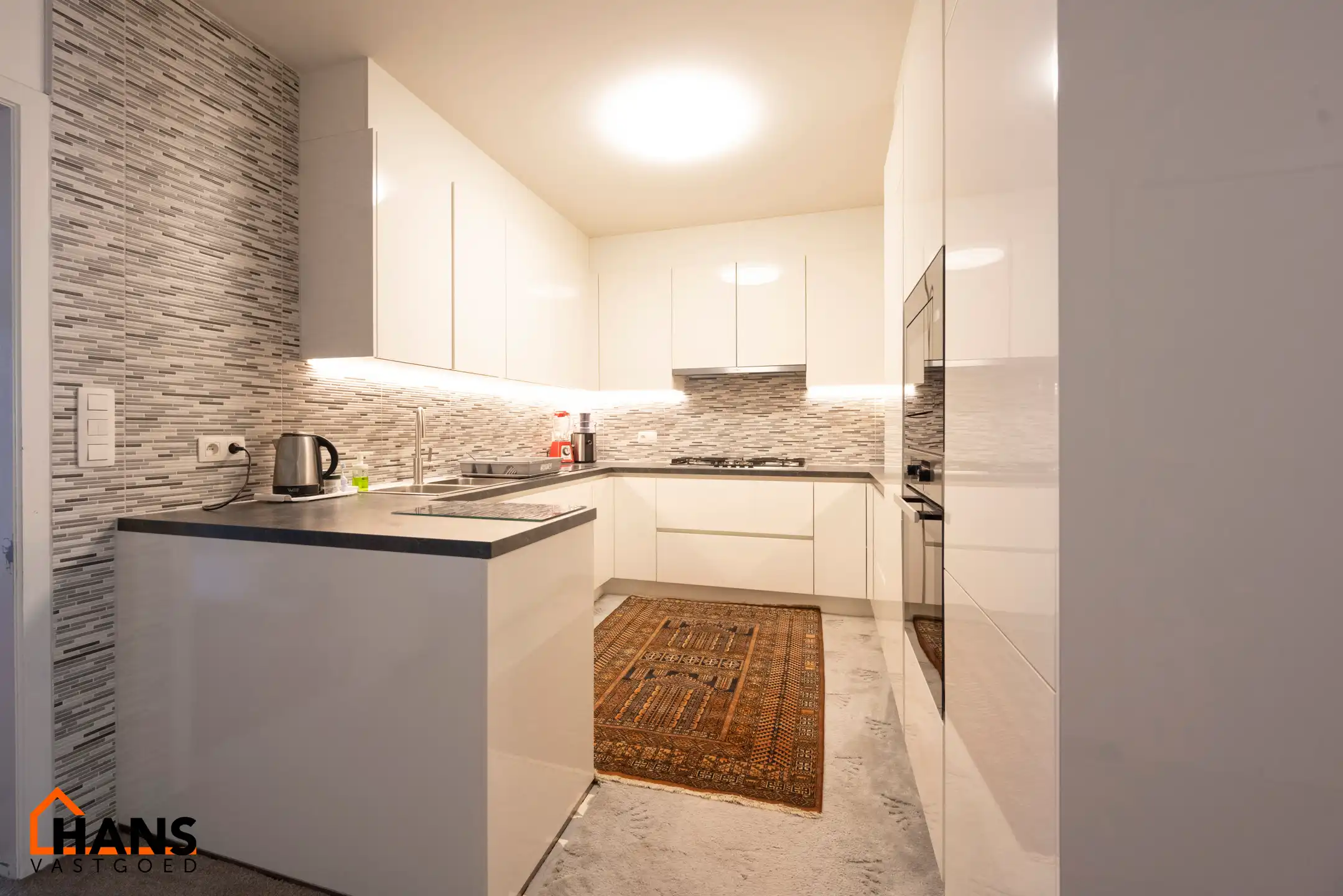 Instapklaar gelijkvloersappartement foto {{pictureIndex}}