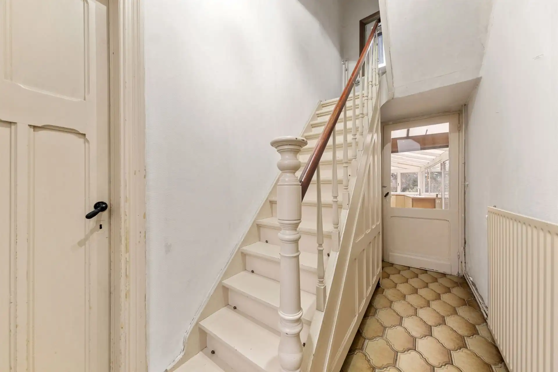 Ideaal gelegen gezinswoning met drie slaapkamers en garage foto 8