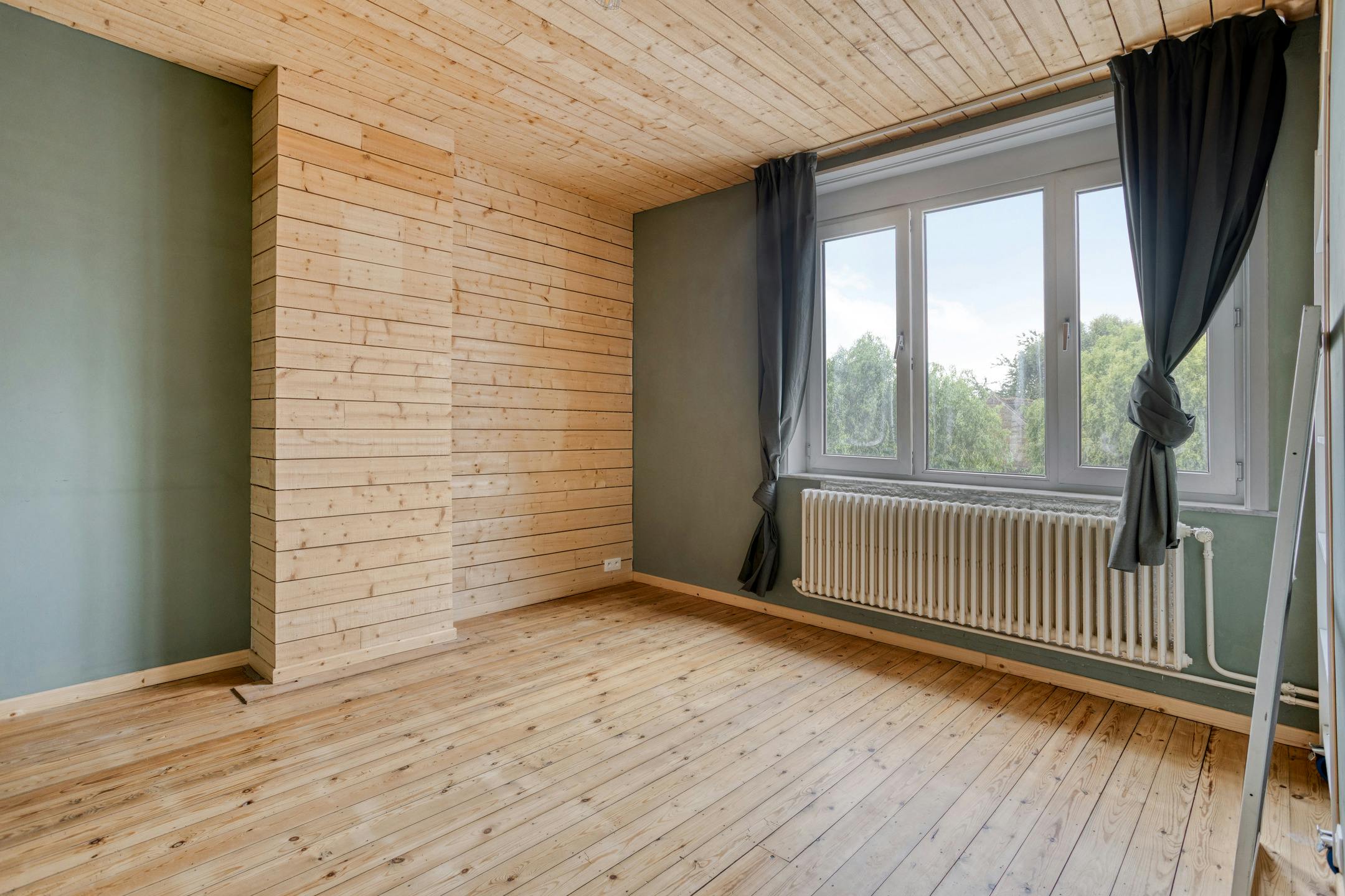 Lichtrijk huis met 4 slaapkamers en zuidwest gerichte tuin in Ieper foto 8