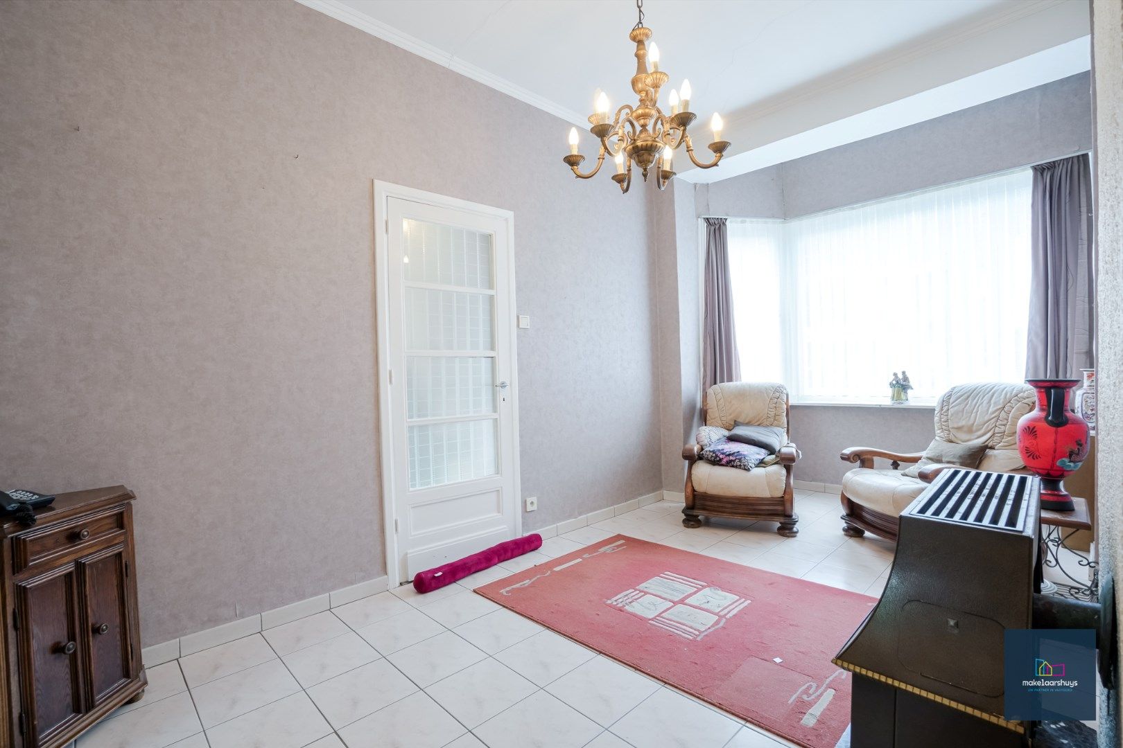 Centraal gelegen te renoveren woning in rij met tuin te Mariakerke foto 3