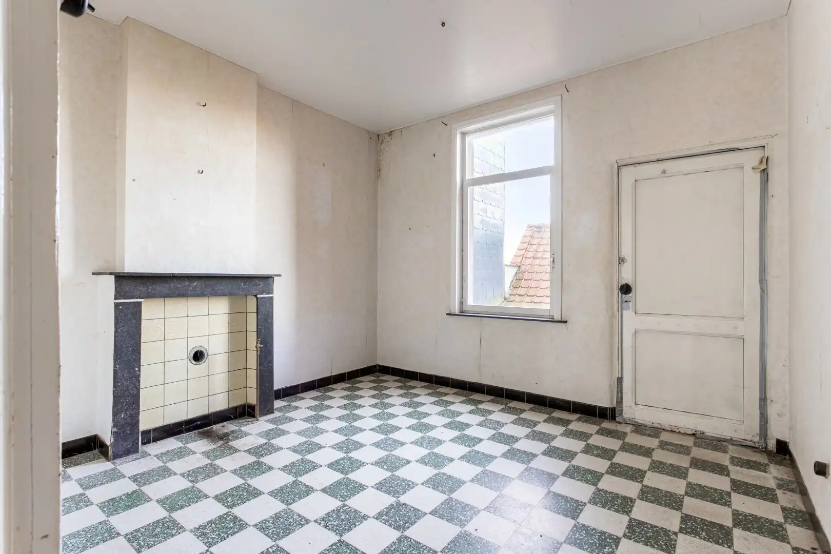 Te renoveren rijwoning met tuin te Vlezenbeek foto 5