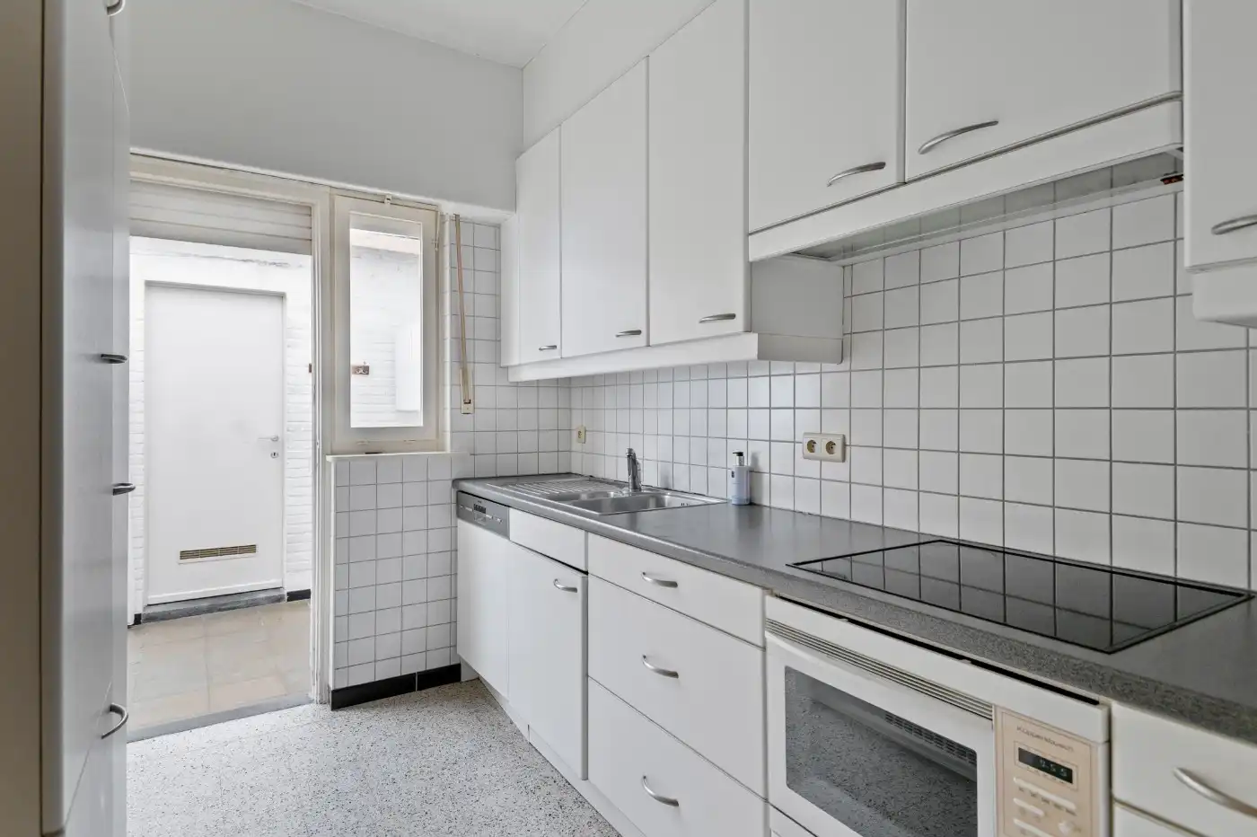 Prima onderhouden woning met 3 à 4 slpk., tuin én mog. garagebox foto 8