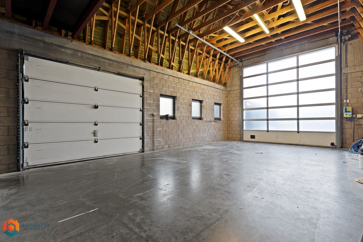 Handelspand met woonst en ruime parking op een perceel van 2592 m² te Rotselaar foto 9