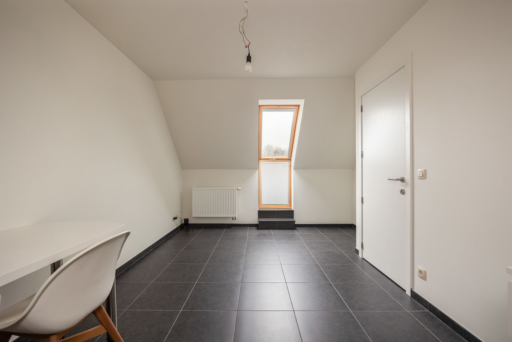 Verrassend ruime gezinswoning met terras, tuin en ondergrondse autostaanplaats. foto 15