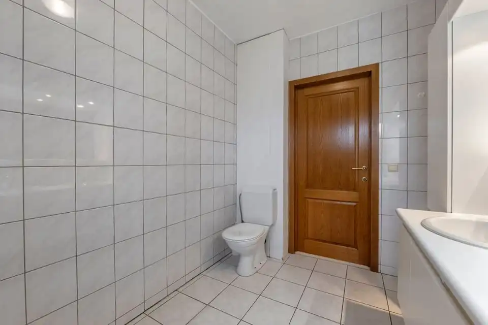 RUIM APPARTEMENT MET UITZONDERLIJK TERRAS VAN +50M² IN SINT-TRUIDEN foto 23