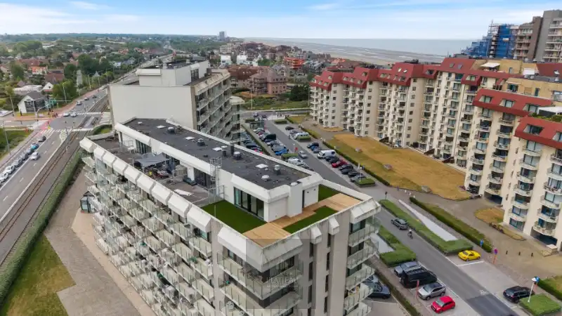 Vernieuwd dakappartement met zeer groot dakterras. foto 35