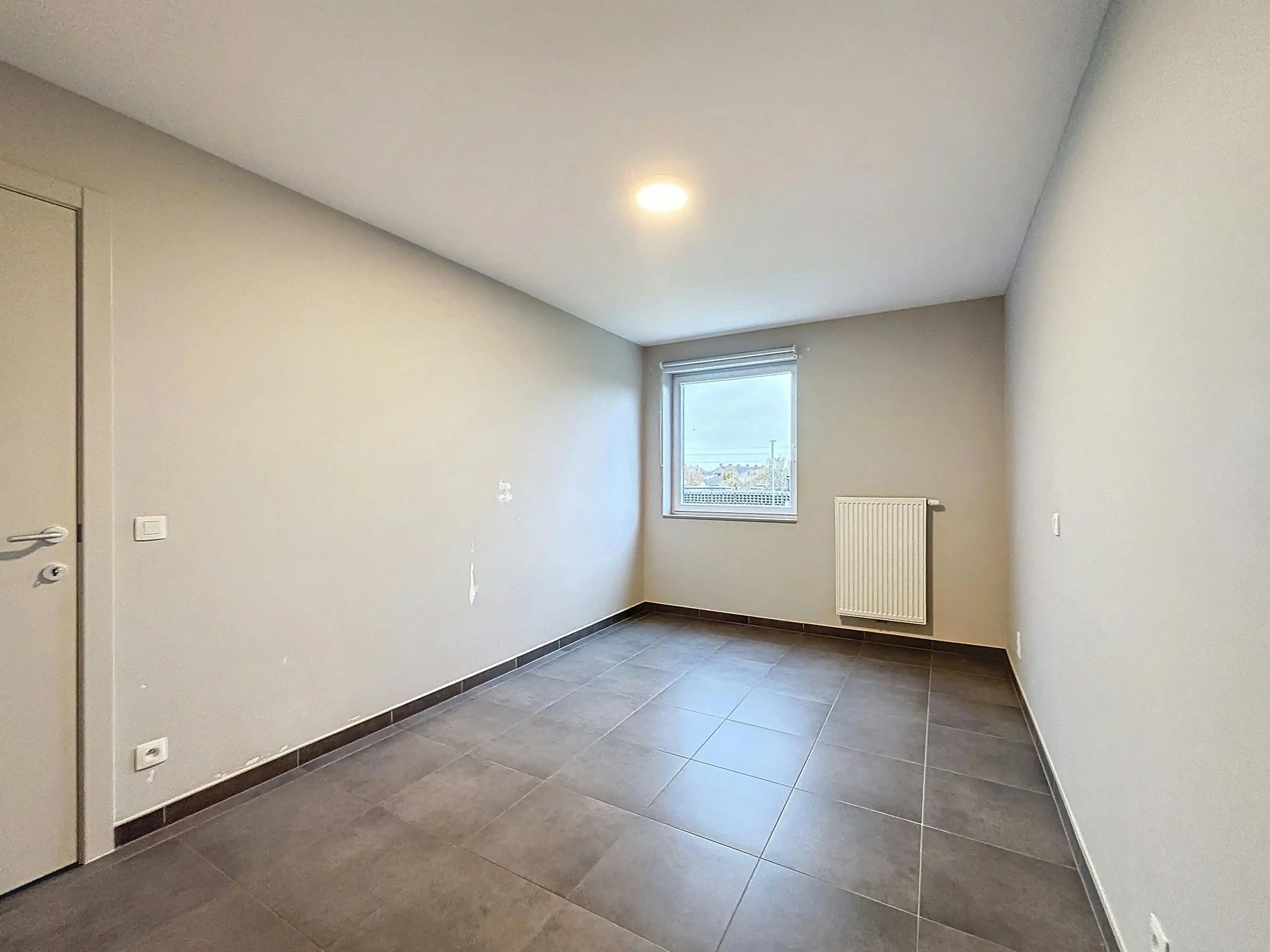 Appartement met 2 slaapkamers en staanplaats te Veurne. foto 8