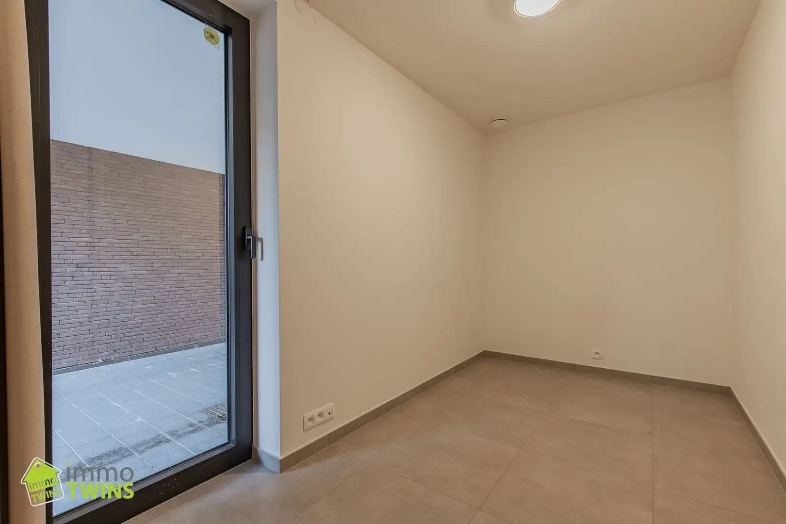 Modern gelijkvloers appartement met tuinterras en staanplaats te Grembergen bij Dendermonde  foto 9