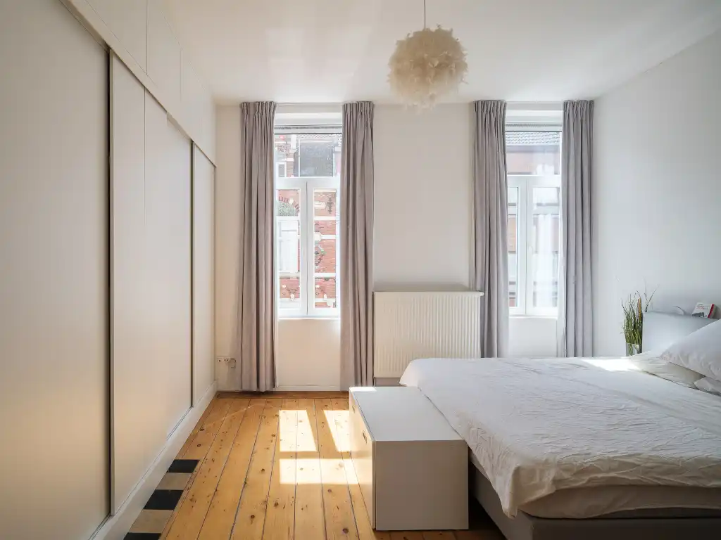 Karaktervolle woning met 4 slaapkamers en zonnige stadstuin op een boogscheut van het centrum van Gent. foto 11