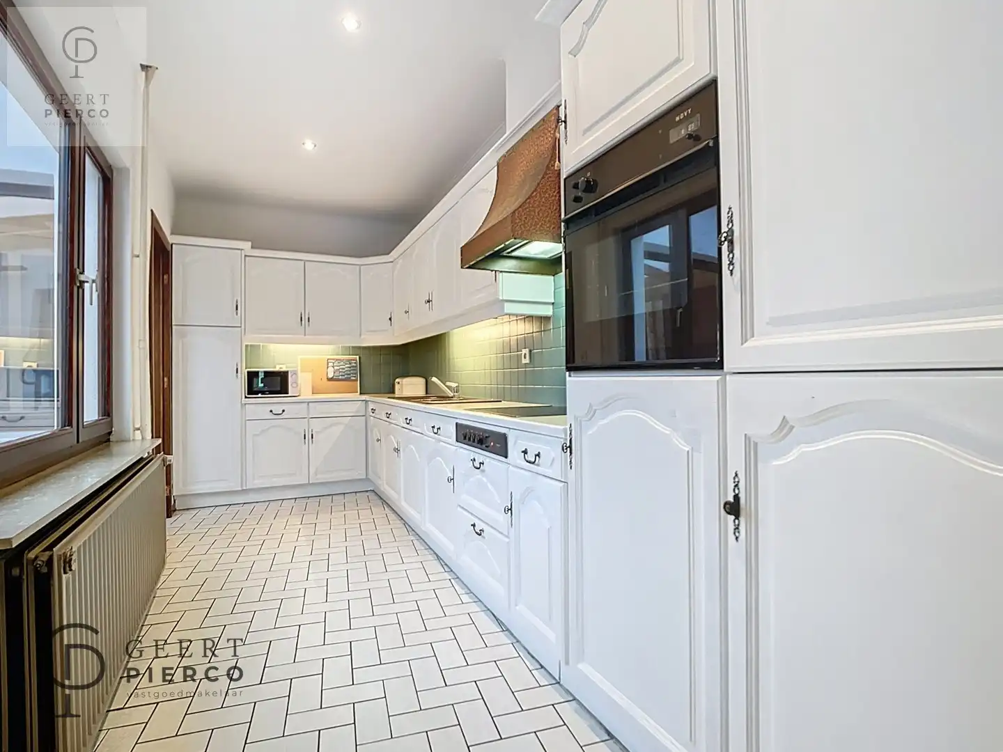 Gezellige gezinswoning met charme en potentieel foto 12