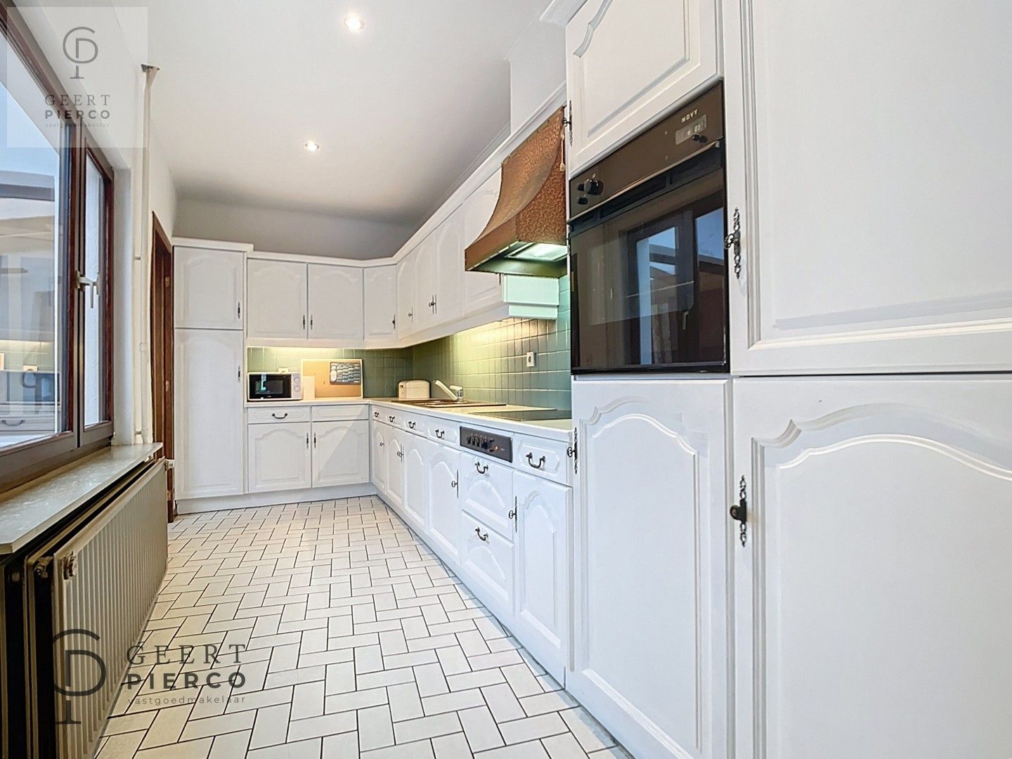 Gezellige gezinswoning met charme en potentieel foto 12