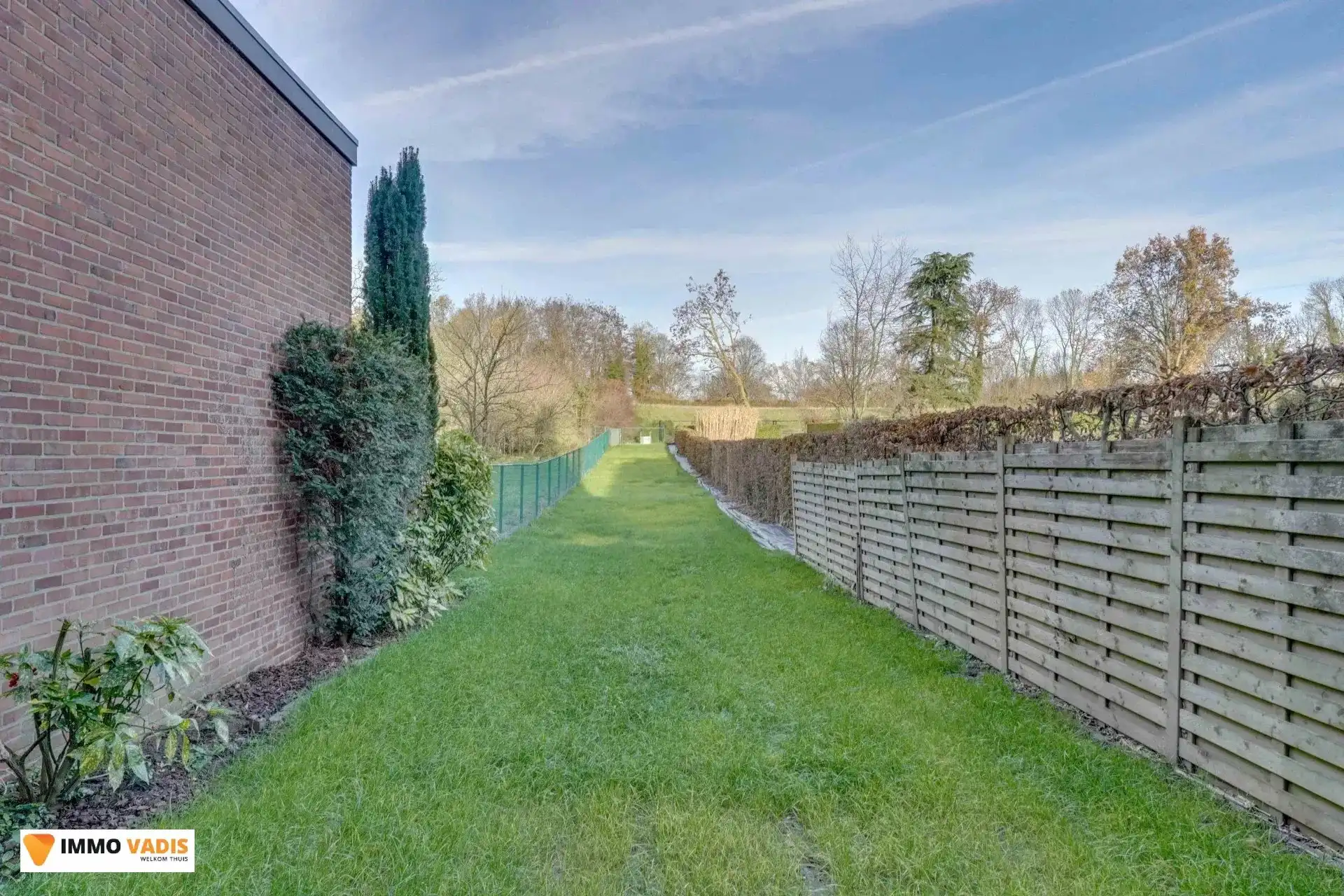 Karaktervolle herenwoning met vier slaapkamers, inpandige garage en tuin foto 20