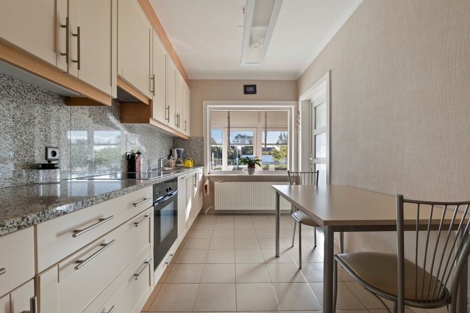 CHARMANTE, INSTAPKLARE WONING MET 3 SLAAPKAMERS, GROTE ZOLDER EN GEEZELLIGE BUITENRUIMTE foto 14