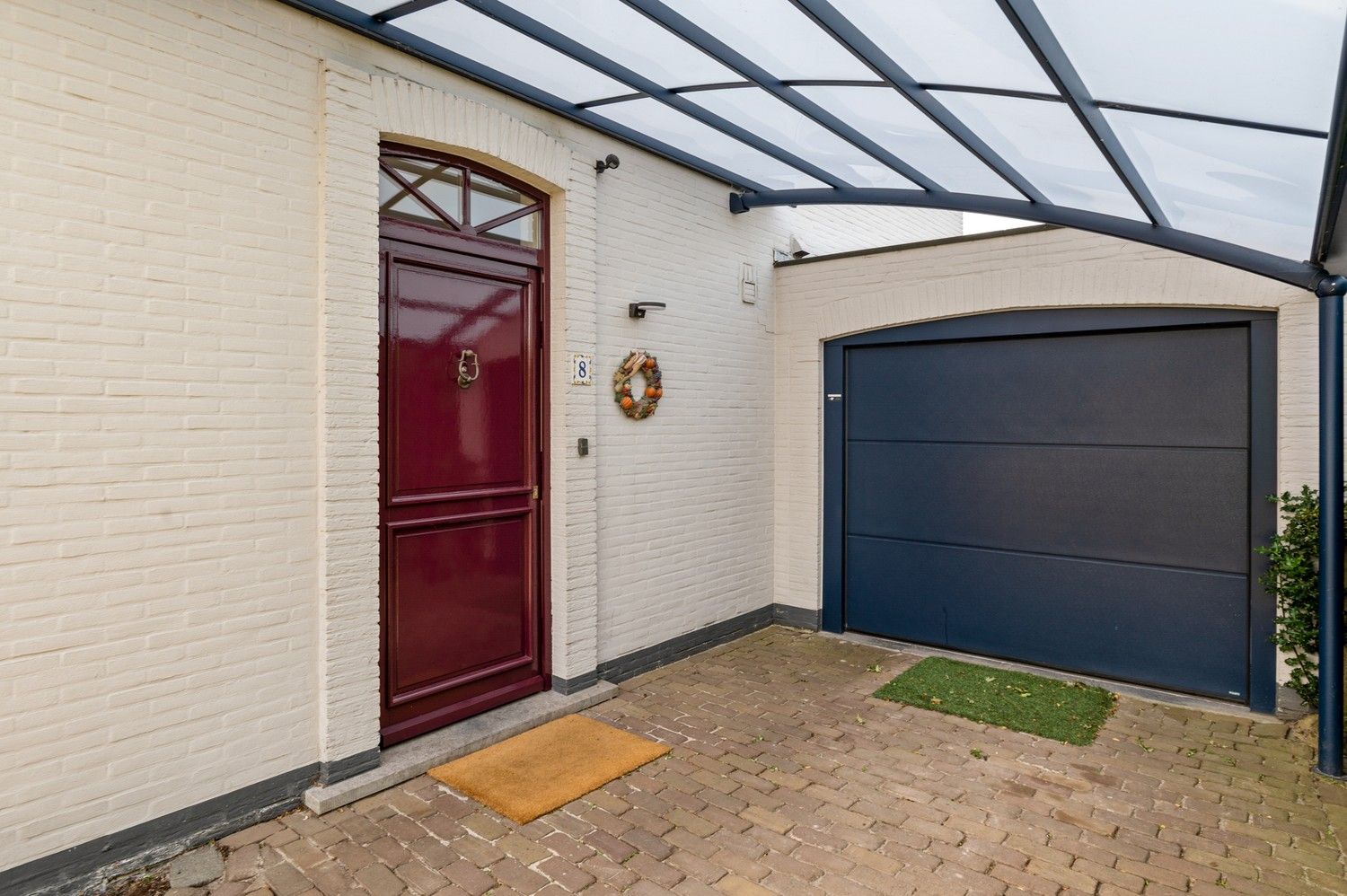 Charmante halfopen woning met 3 slaapkamers met ruime tuin in een doodlopende straat te Burcht! foto 2