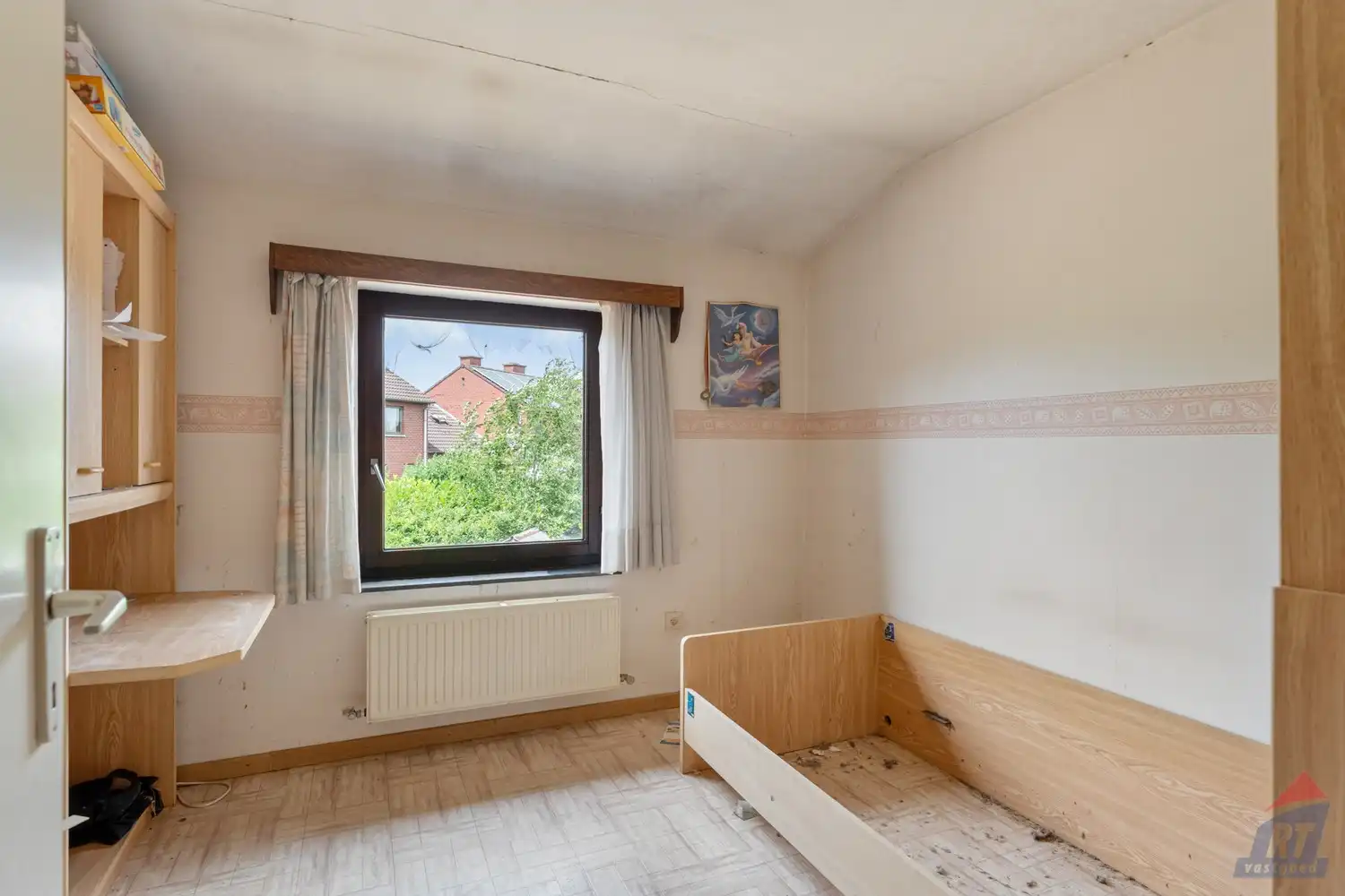 Te renoveren halfopen bebouwing met 3 slaapkamers, garage en tuin op rustige ligging in Ulbeek foto 13