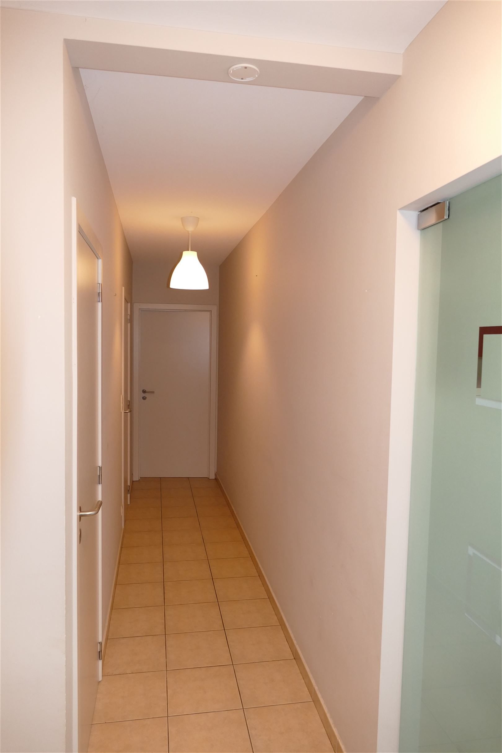 Gelijkvloers appartement met terras en garage foto 6