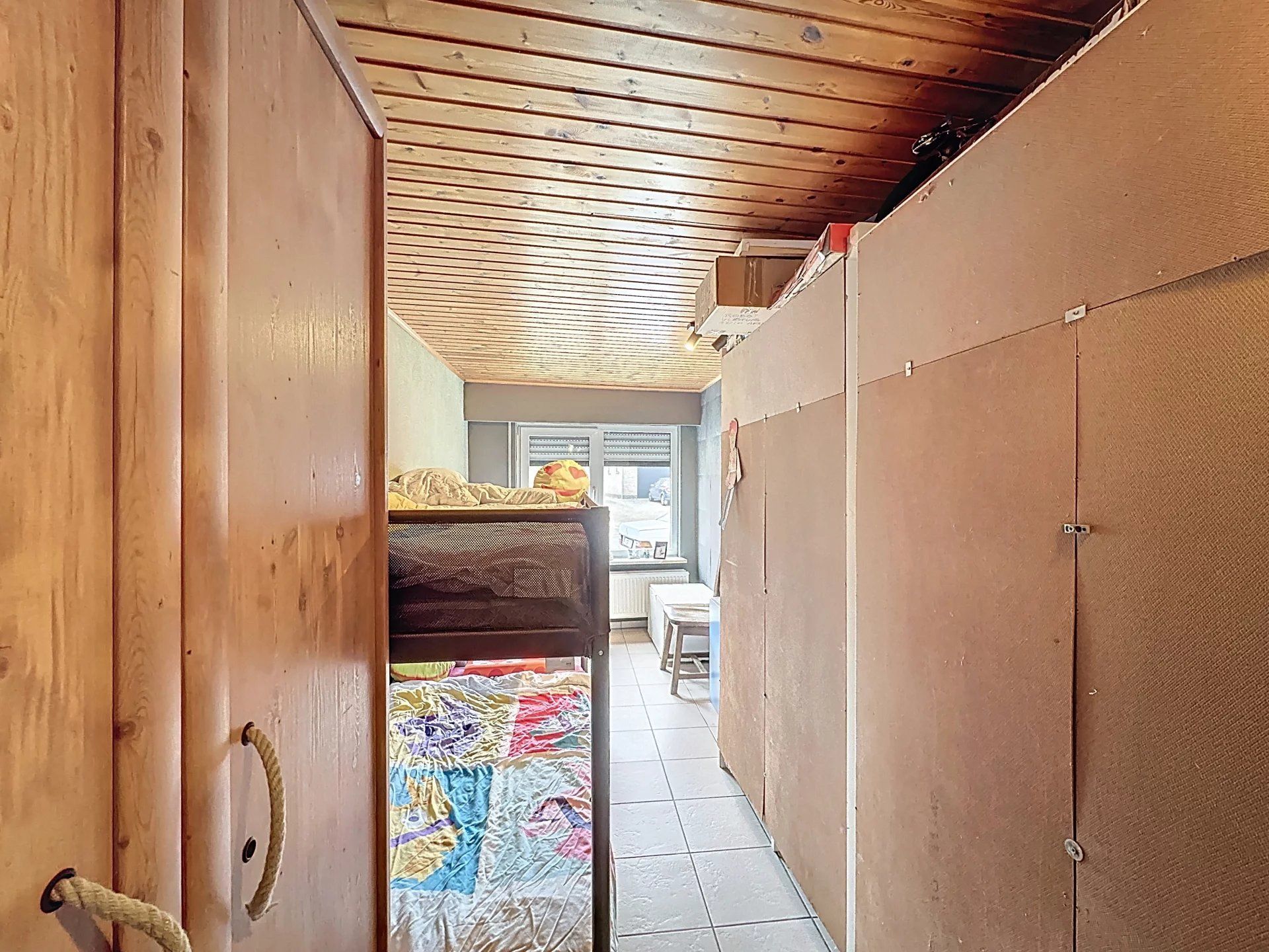 Gelijkvloerse woning met tuintje en momenteel 4 slaapkamers foto 9