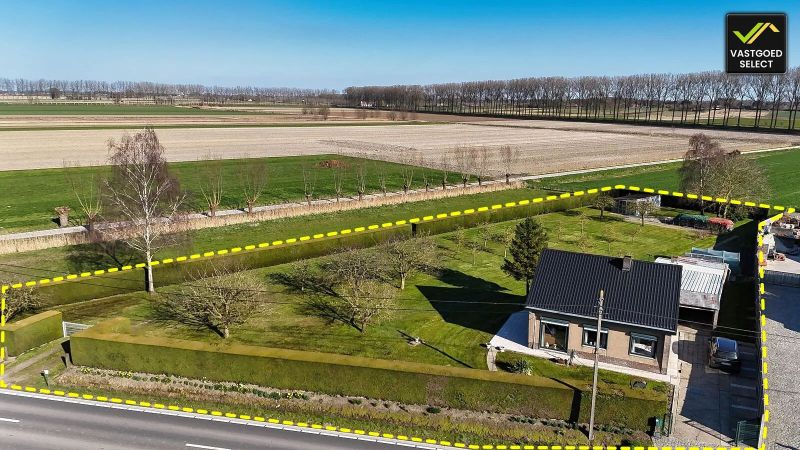 Hoofdfoto van de publicatie: Vastgoed Select: Open bebouwing op 3.435 m² en prachtig uitzicht in Sint-Laureins.