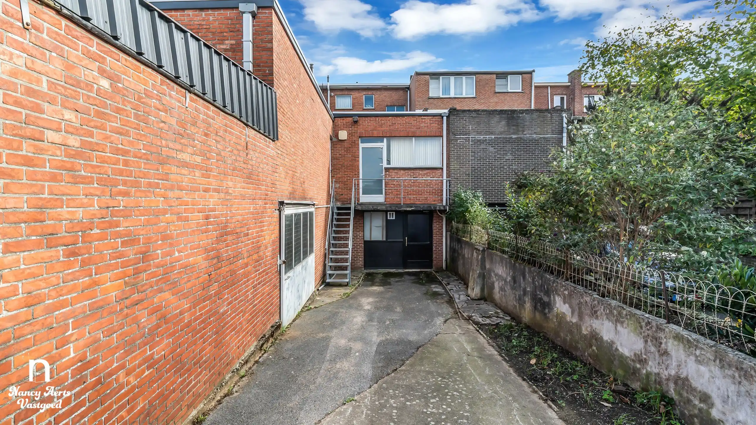 Handelspand van 395 m² in het centrum van Beringen foto 23