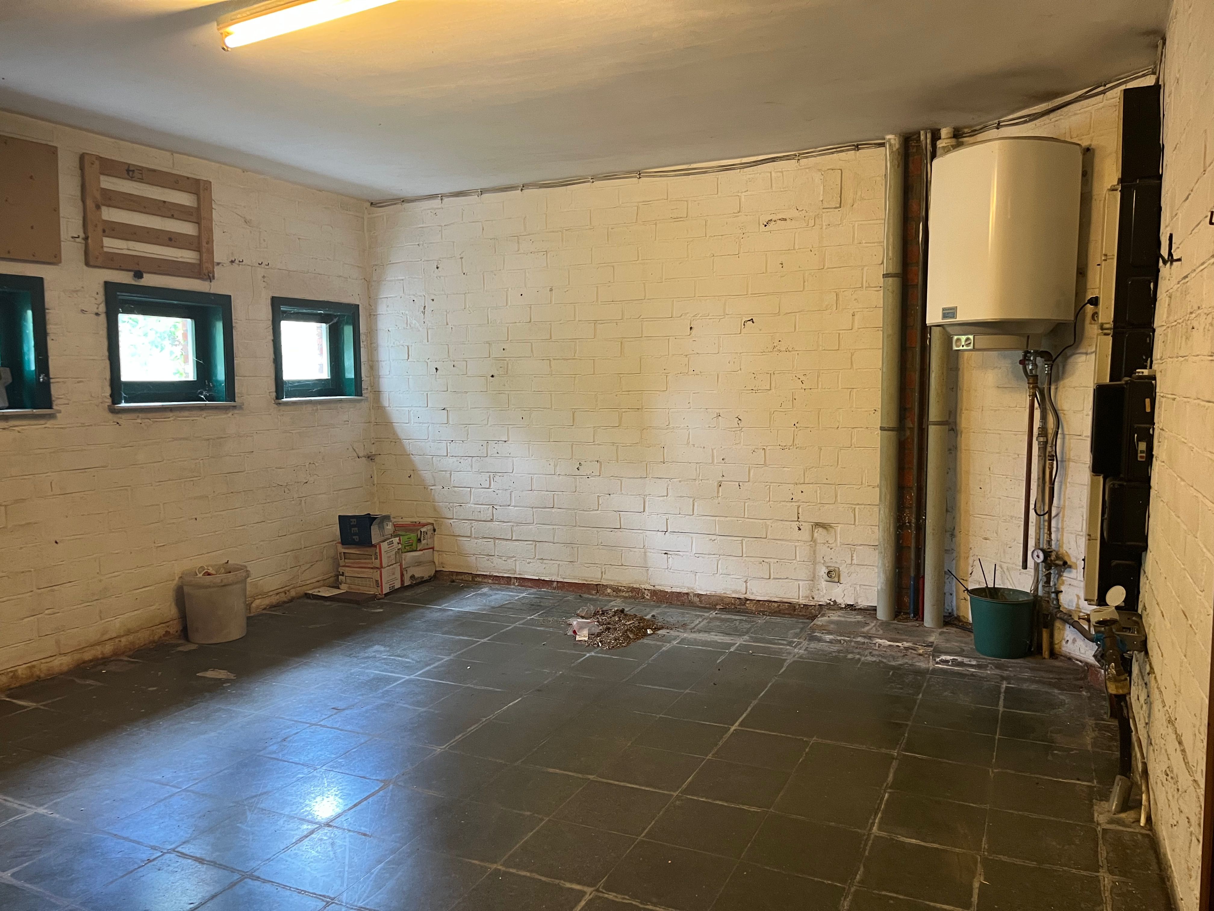 Te renoveren open bebouwing met karakter en ruime tuin. foto 9