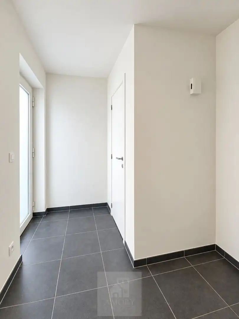 Lichtrijke en energiezuinige woning met 3 slpk's, tuin en garage foto 9
