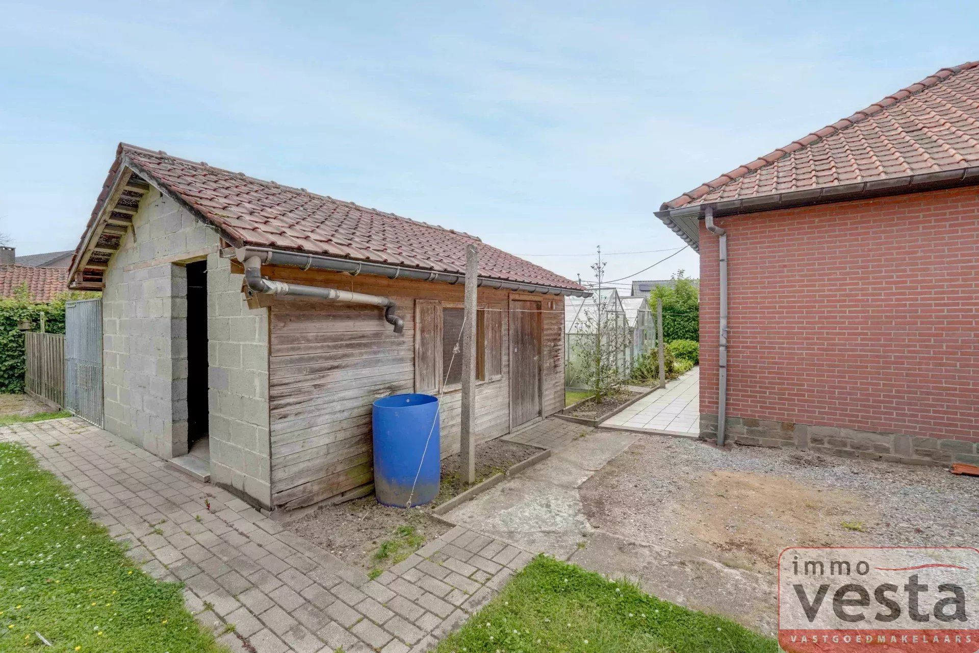 Bungalow met vier slaapkamers, inpandige garage en ruime tuin in Kortessem foto 18