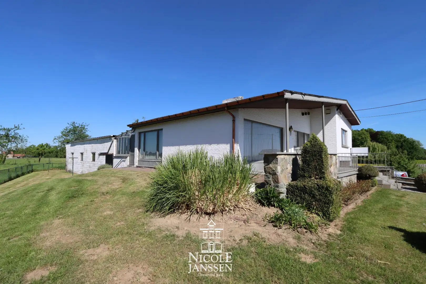 Woning met loods/stallen foto 18