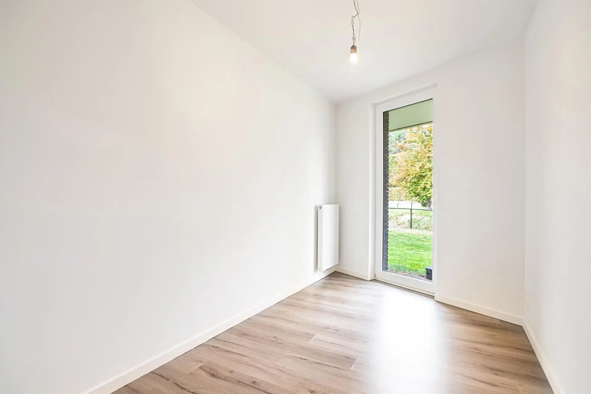 Lichtrijk gelijkvloers appartement met terras en tuinzicht foto 18