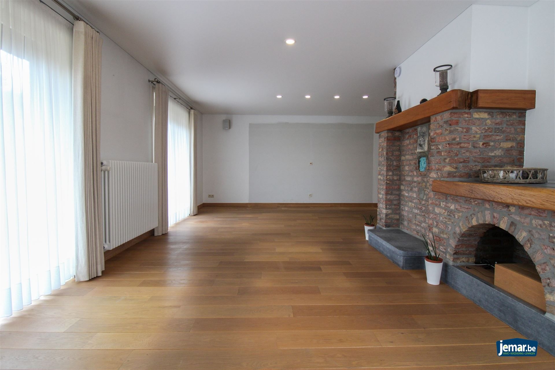 Instapklare en perfect onderhouden woning met 3 slaapkamers, 2 badkamers en een prachtige tuin van 6a74ca  in hartje Maasmechelen! foto 6