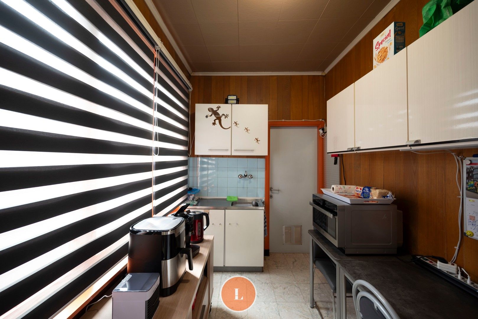 Te renoveren woning te koop in centrum Menen foto 6