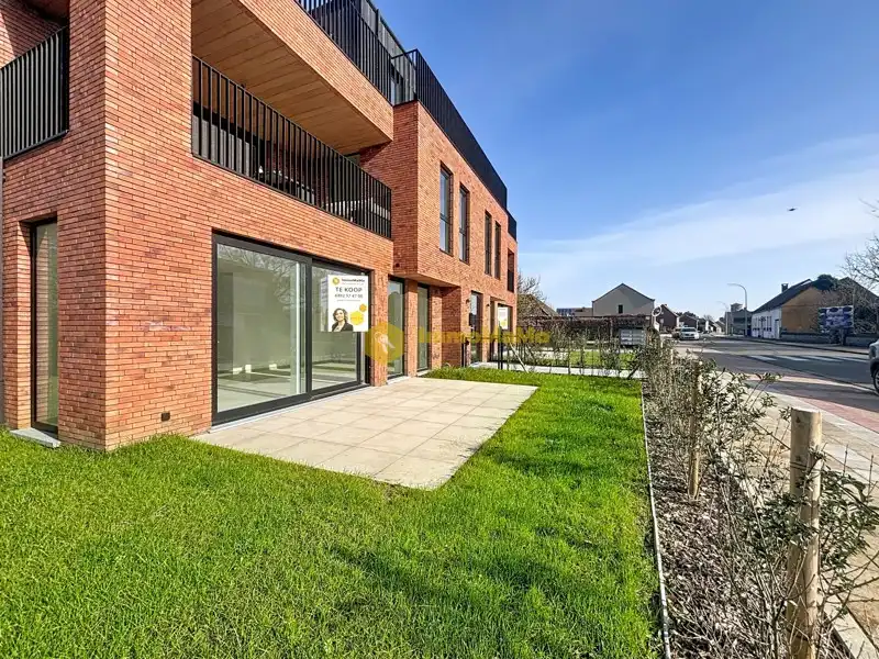 NIEUWBOUW APPARTEMENT MET 2 SLAAPKAMERS EN TUIN TE KOOP IN WACHTEBEKE foto {{pictureIndex}}