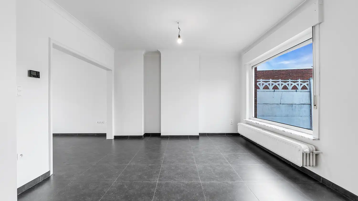 Totaal gerenoveerde en energiezuinige gezinswoning met 3 slaapkamers, carport voor 2 wagens en zonnige tuin in Paal foto 3