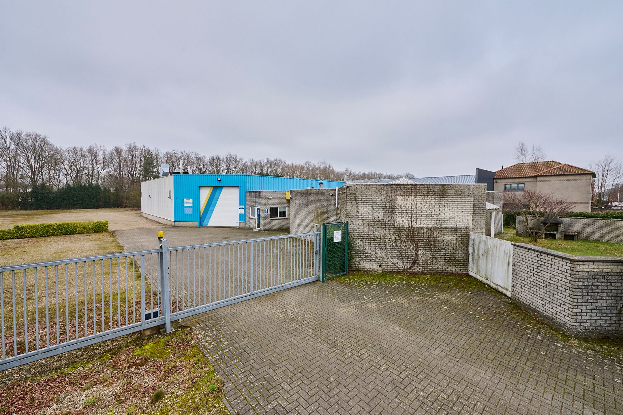 TE KOOP: bedrijfsgebouw met woning in Zonhoven foto 12