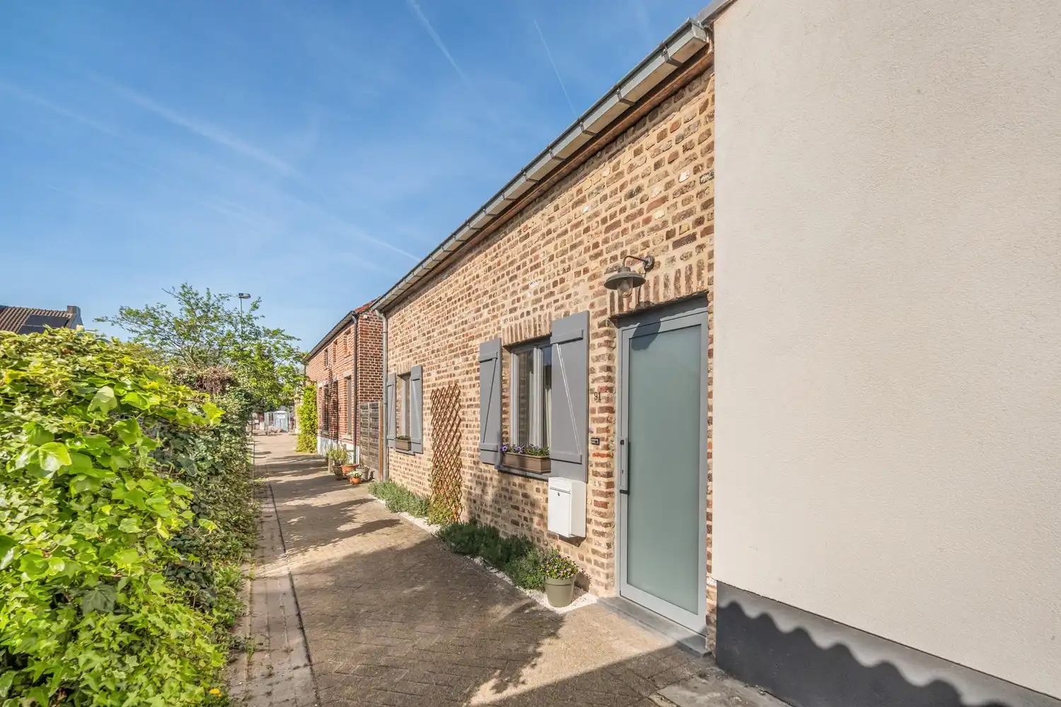 Rustig gelegen en halfopen woning met 3/4 slaapkamers en een tuin nabij de Vaart te Herent! foto 2