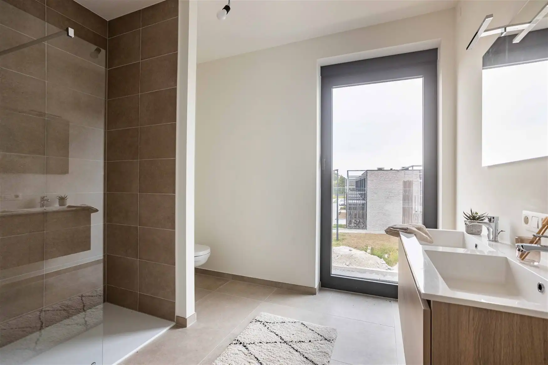 Ruim appartement met 2 leefterrassen foto 12