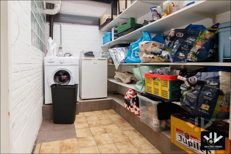 Instapklaar gelijkvloers appartement met ruime tuin te Tuilt foto 15