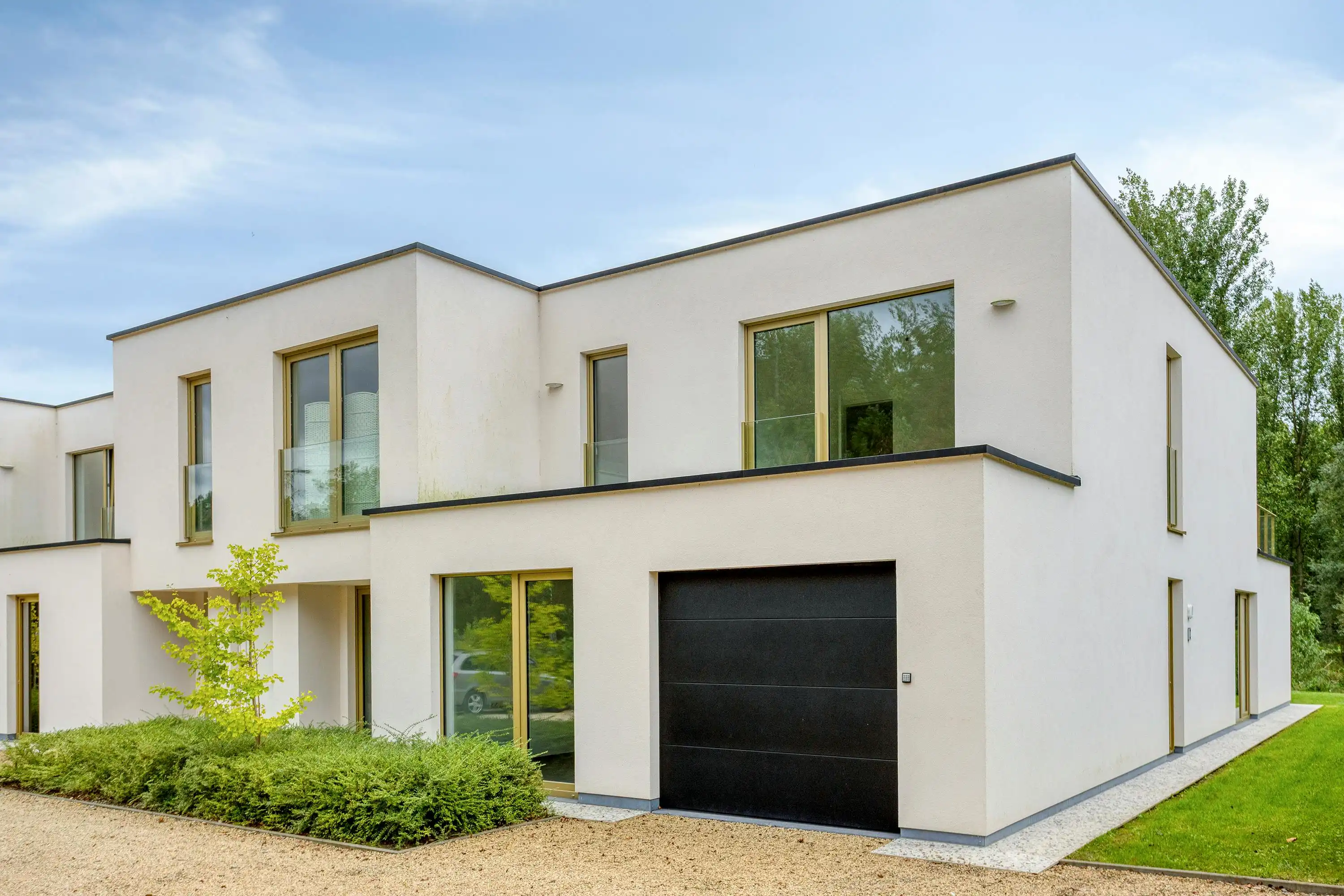 Luxueuze passiefwoning met zuidgerichte tuin foto {{pictureIndex}}