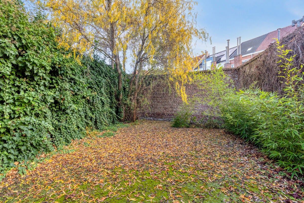 Charmante op te frissen woning met 4 slaapkamers en stadstuintje! foto 15