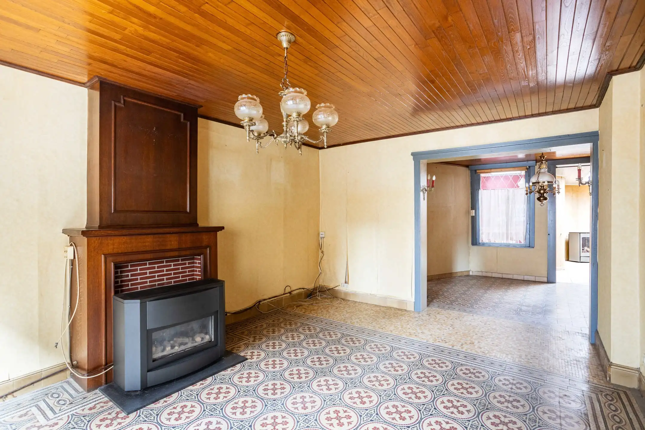 Te renoveren woning met aangename stadstuin foto 5