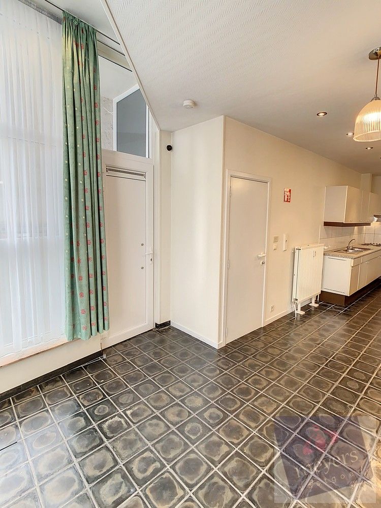 Unieke kans in het hart van Sint-Truiden – woning met dubbele ingang en tal van mogelijkheden! foto 7